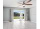 Spacious living room with sliding doors to backyard at 4214 Duck Creek Way, Ellenton, FL 34222