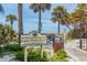 Beach access with signage and walkway at 322 Windrush Blvd # 4, Indian Rocks Beach, FL 33785