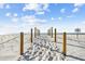 Beach access path with wooden posts and rope at 322 Windrush Blvd # 4, Indian Rocks Beach, FL 33785