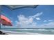 Ocean view from under beach umbrella at 322 Windrush Blvd # 4, Indian Rocks Beach, FL 33785
