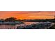 Stunning sunset over calm waters, boats docked, and waterfront homes at 322 Windrush Blvd # 4, Indian Rocks Beach, FL 33785