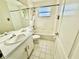 Bathroom with single vanity, bathtub and shower at 3619 Springville Dr, Valrico, FL 33596