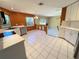 Kitchen with stainless steel appliances and orange walls at 3619 Springville Dr, Valrico, FL 33596