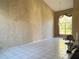 Spacious living room with high ceilings and tile floors at 3619 Springville Dr, Valrico, FL 33596