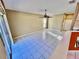 Living area with tile floors and sliding glass doors at 3619 Springville Dr, Valrico, FL 33596