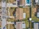 Aerial view of a single-Gathering home with a large backyard, and a swimming pool at 9126 109Th Ter, Seminole, FL 33777