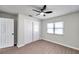 Spacious bedroom with wood-look floors and a large closet at 9126 109Th Ter, Seminole, FL 33777