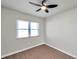 Well-lit bedroom, featuring a ceiling fan and a large window at 9126 109Th Ter, Seminole, FL 33777