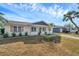 Updated ranch-style home featuring a gray roof and white exterior at 9126 109Th Ter, Seminole, FL 33777