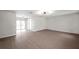 Living room with sliding doors leading to the backyard at 9126 109Th Ter, Seminole, FL 33777