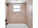 Clean shower with neutral tile and updated fixtures at 9126 109Th Ter, Seminole, FL 33777