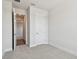 Bright bedroom with a neutral color palette and carpet at 11826 Richmond Trl, Parrish, FL 34219