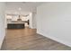 An open kitchen with an island, stainless steel appliances and modern cabinets at 11826 Richmond Trl, Parrish, FL 34219