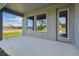 Outdoor patio provides a lovely view of the lush landscaping at 11826 Richmond Trl, Parrish, FL 34219