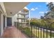 Private balcony overlooking lush green landscape at 125 Mariner Dr # 125, Tarpon Springs, FL 34689
