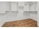 Large walk-in closet with ample shelving and hanging space at 125 Mariner Dr # 125, Tarpon Springs, FL 34689
