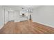 Spacious dining room featuring hardwood floors and an open concept layout at 125 Mariner Dr # 125, Tarpon Springs, FL 34689