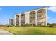 Condo building with Spanish-style architecture at 125 Mariner Dr # 125, Tarpon Springs, FL 34689