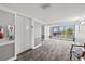 Building hallway with elevator and waterfront view at 125 Mariner Dr # 125, Tarpon Springs, FL 34689
