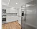 Updated kitchen featuring stainless steel appliances and white shaker cabinets at 125 Mariner Dr # 125, Tarpon Springs, FL 34689