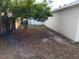 Fenced backyard providing privacy and ample space at 1302 E Annie St, Tampa, FL 33612