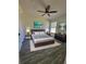Spacious bedroom with wood flooring and ample natural light at 1302 E Annie St, Tampa, FL 33612