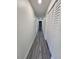 Clean hallway with wood-look flooring and built-in storage at 1302 E Annie St, Tampa, FL 33612