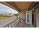Private balcony overlooks tree-lined street and neighborhood homes at 1414 Alhambra Dr, Apollo Beach, FL 33572