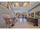 Two-story foyer with elegant staircase and high ceilings at 1414 Alhambra Dr, Apollo Beach, FL 33572