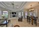 Spacious Gathering room with a fireplace and large windows at 1414 Alhambra Dr, Apollo Beach, FL 33572