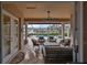 Relaxing screened-in pool and patio area with lake view at 1414 Alhambra Dr, Apollo Beach, FL 33572