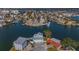Expansive aerial view of a waterfront community with beautiful homes and stunning water views at 17410 1St E St, Redington Shores, FL 33708