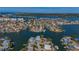 Panoramic aerial view of a coastal community with stunning waterfront properties and scenic waterways at 17410 1St E St, Redington Shores, FL 33708