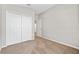 Bedroom with double door closet and neutral-toned walls at 4427 Ashton Meadows Way, Wesley Chapel, FL 33543