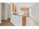 Kitchen with light wood cabinets and granite countertops at 4427 Ashton Meadows Way, Wesley Chapel, FL 33543