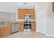 Clean and efficient kitchen featuring stainless steel appliances at 4427 Ashton Meadows Way, Wesley Chapel, FL 33543