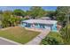 Charming teal home with a gray deck at 6500 7Th S Way, St Petersburg, FL 33705