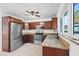 Updated kitchen featuring granite countertops and wood cabinets at 6500 7Th S Way, St Petersburg, FL 33705