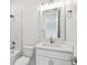 Clean bathroom, featuring a vanity with quartz countertop and a frameless shower at 709 W Orient St, Tampa, FL 33603