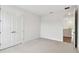 Spacious bedroom with carpet flooring and access to hallway at 709 W Orient St, Tampa, FL 33603