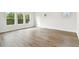 Bright bedroom with wood-look floors and large windows at 709 W Orient St, Tampa, FL 33603