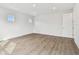 Bright bedroom with wood-look floors and large windows at 709 W Orient St, Tampa, FL 33603