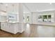 Modern kitchen with white cabinets and island at 709 W Orient St, Tampa, FL 33603