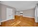 Hardwood floors and view into kitchen from living room at 2905 W Fountain Blvd, Tampa, FL 33609