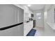 Updated kitchen with white cabinets and stainless steel appliances at 4444 Swift Rd # 20, Sarasota, FL 34231