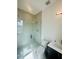 Modern bathroom with a walk-in shower and vanity at 4608 S Ferdinand Ave, Tampa, FL 33611