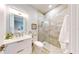Clean bathroom with a large walk in shower and modern fixtures at 10101 Eagle Preserve Dr, Englewood, FL 34224