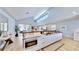 Modern kitchen with built-in microwave and island seating at 10101 Eagle Preserve Dr, Englewood, FL 34224
