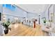 Open living space with hardwood floors and high ceilings at 10101 Eagle Preserve Dr, Englewood, FL 34224