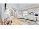 Open living room with hardwood floors and modern decor at 10101 Eagle Preserve Dr, Englewood, FL 34224